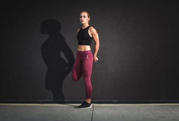 female athlete stretching