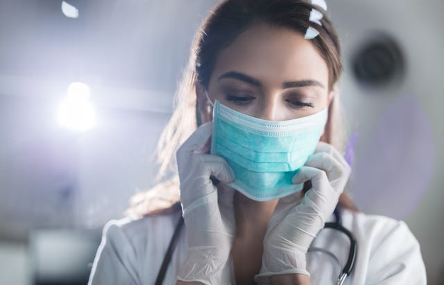 Female doctor with protective mask