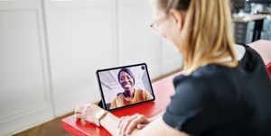 female executives having video call in office