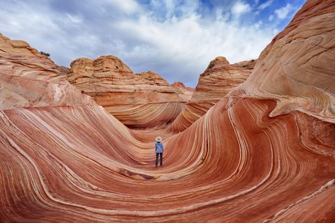 Female hiker in Coyote Buttes North, Vermilion Cliffs National Monument, Arizona