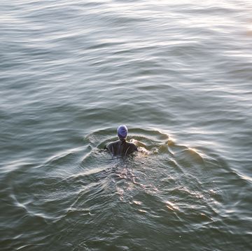female open water swimmer in the sea