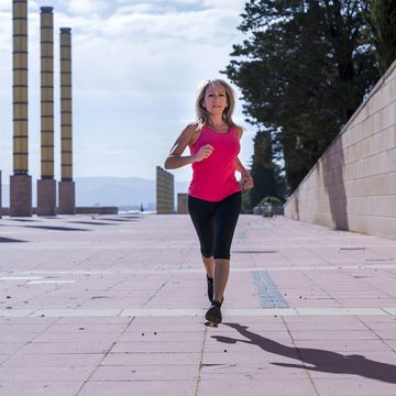 female runner during urban workout