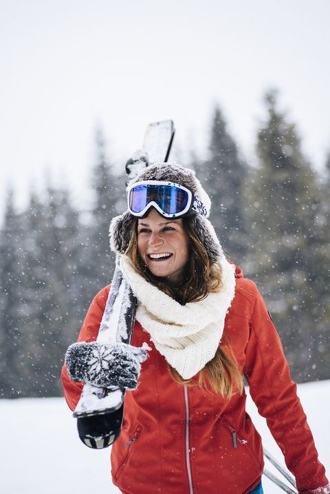 Female skier enjoying snow