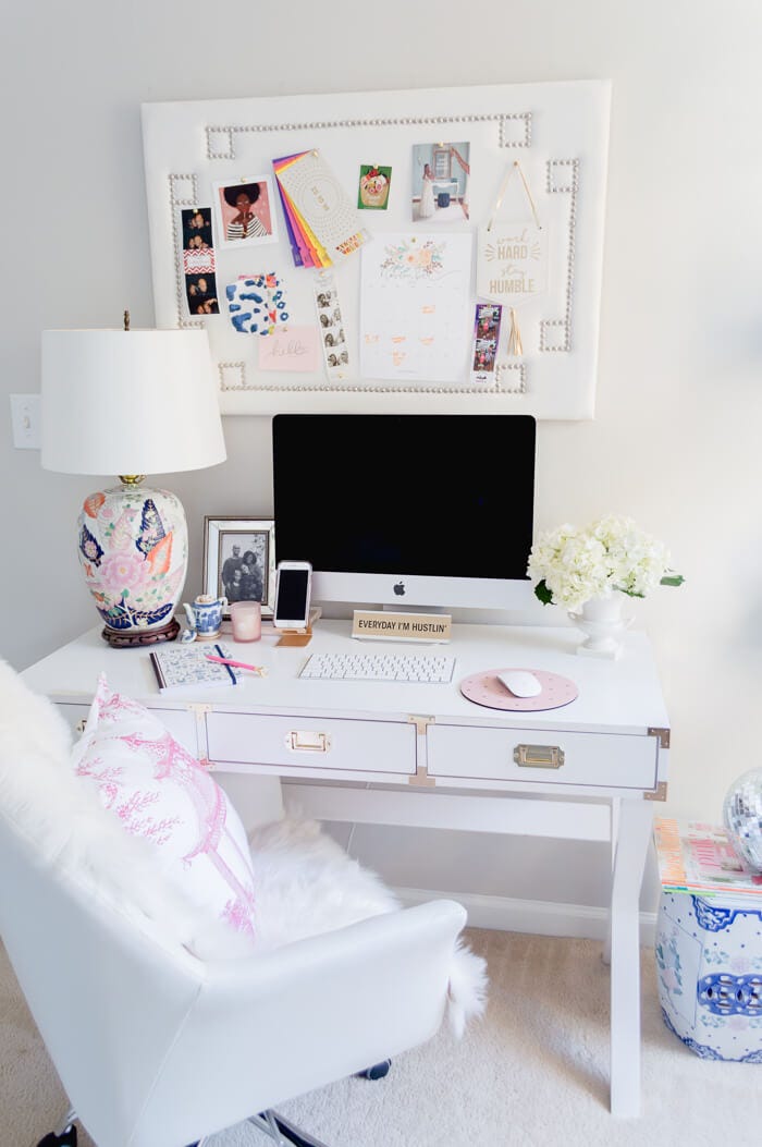 functional workspace with a desk computer and decorative elements