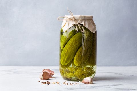 fermenting cucumbers in glass jar