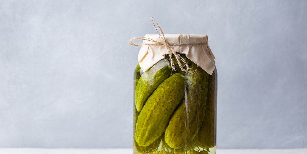 fermenting cucumbers in glass jar