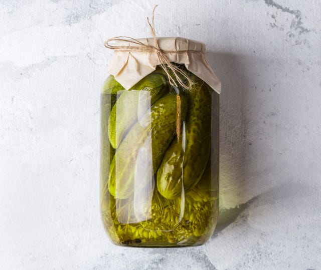 fermenting cucumbers in glass jar