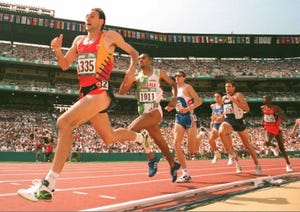 Fermin Cacho of Spain leads the pack as he runs to