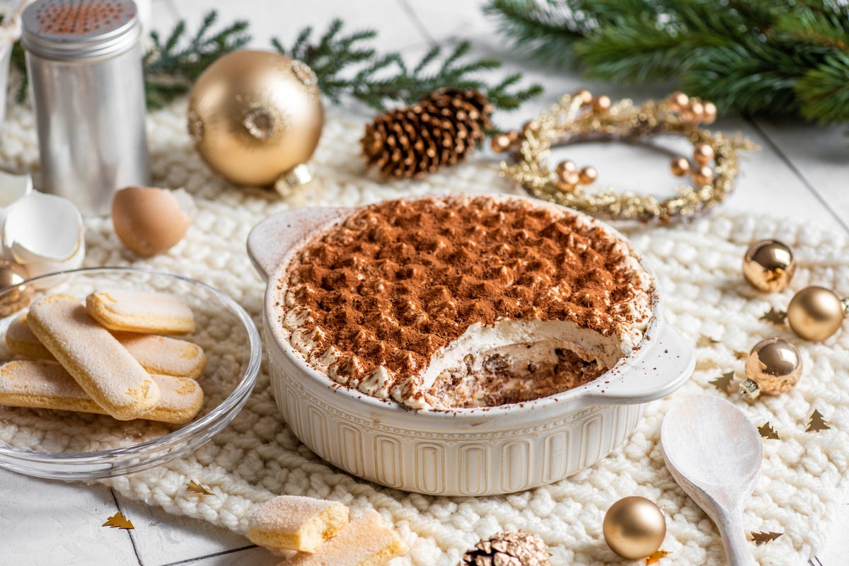 https://hips.hearstapps.com/hmg-prod/images/festive-christmas-dessert-tiramisu-sponge-cake-in-royalty-free-image-1701180502.jpg?crop=0.669xw:1.00xh;0.0329xw,0&resize=1200:*