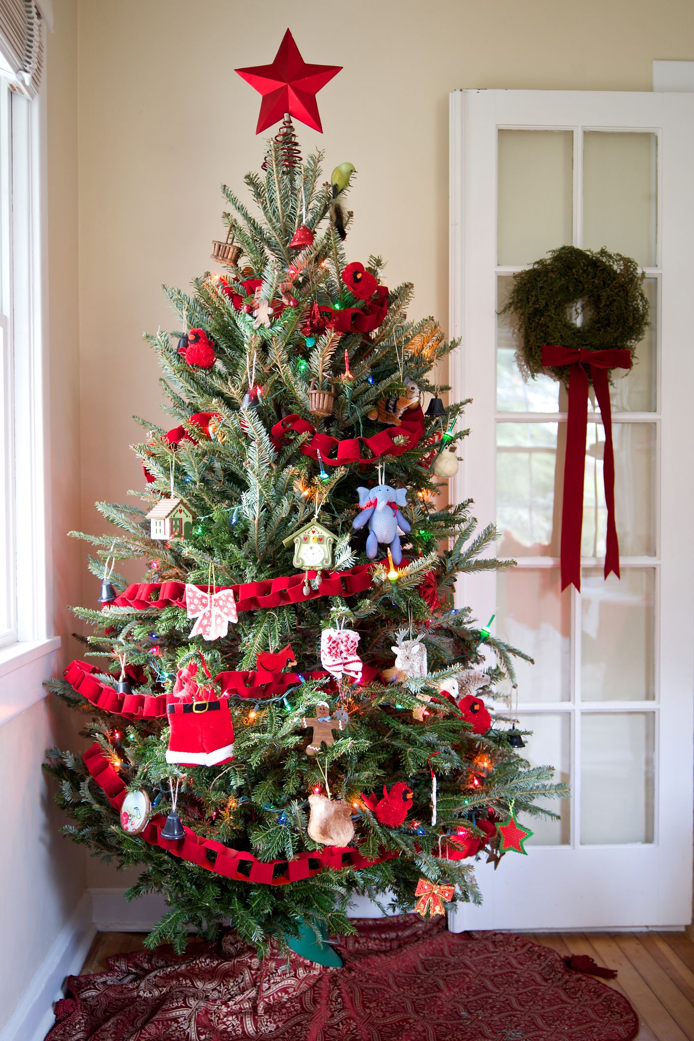 Christmas Trees Decorated With Red Ribbon