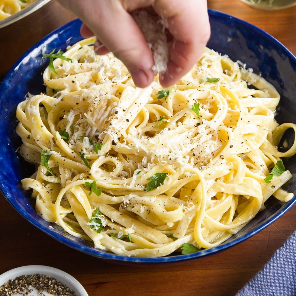 fettuccine noodles coated in alfredo sauce