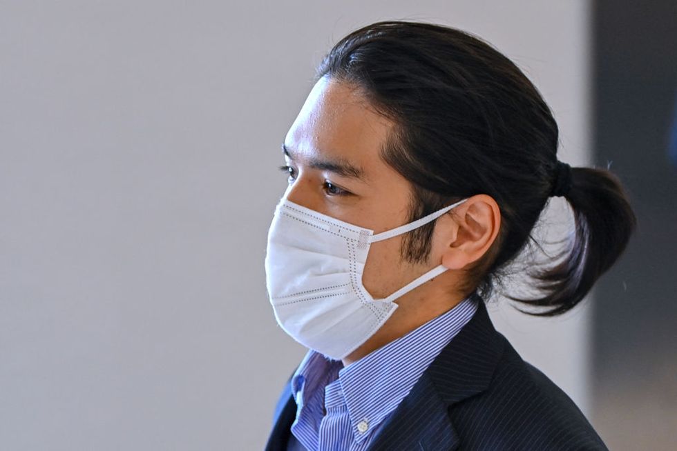 kei komuro, the boyfriend of japans princess mako, arrives at narita airport in chiba prefecture on september 27, 2021 from the united states photo by kazuhiro nogi  afp photo by kazuhiro nogiafp via getty images