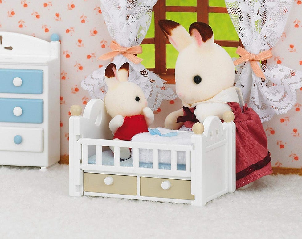 Set de figura de bebé y cuna