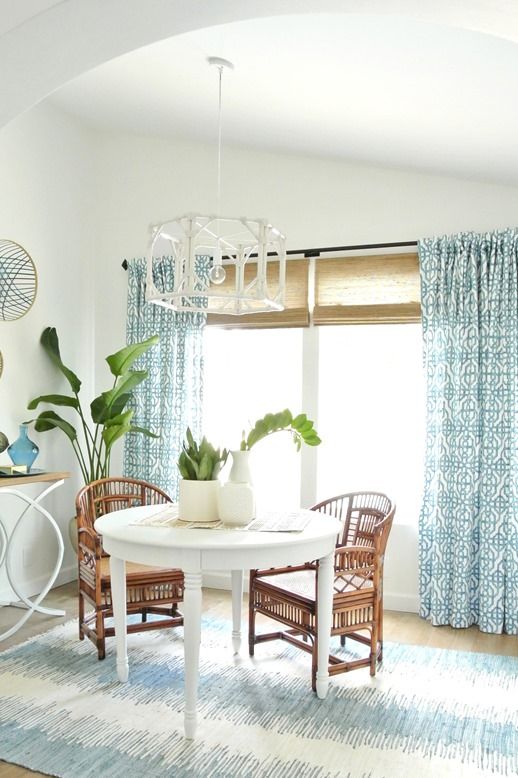 sunroom ideas with blue and white patterned curtains and rug