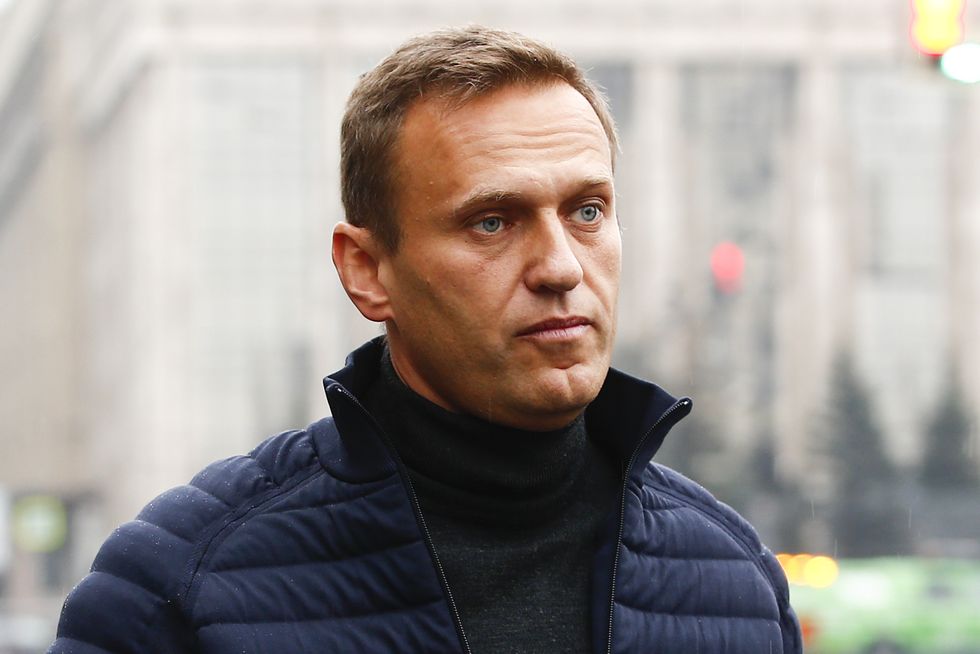 alexei navalny unconscious in hospital with suspected poisoning