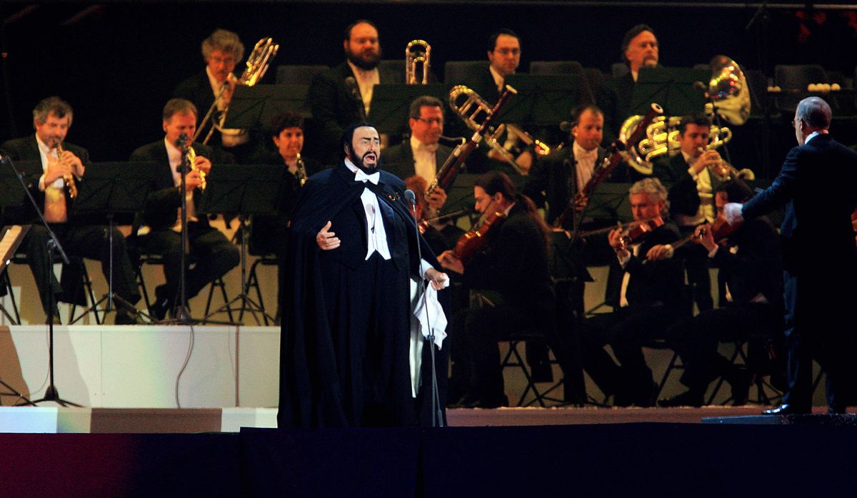 Olympic Opening Ceremony Performers: In 2006, Italian opera singer Luciano Pavarotti graced the stage for the last time before his death in 2007. At the Opening Ceremonies for the Winter Olympics in Turin he performed 'Nessun dorma,' to a roaring standing ovation. (Photo: AFP/Getty Images)