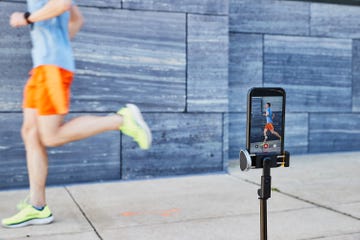 Mobile phone capturing a runner in motion