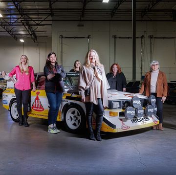 michele mouton and other female racers standing next to an audi quattro