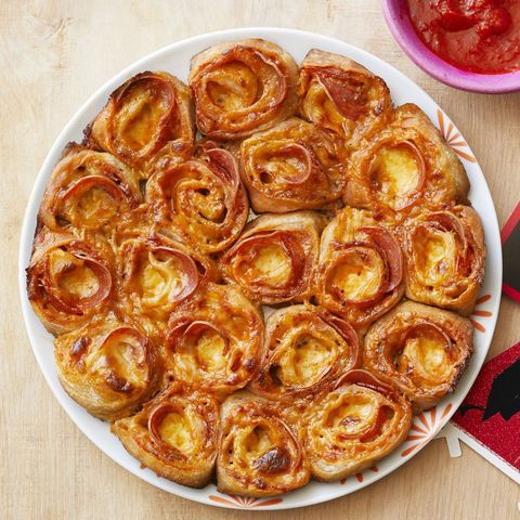 pepperoni pizza rolls on wood surface
