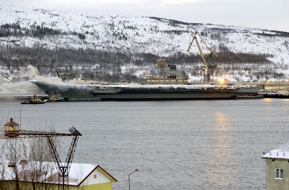 admiral kuznetsov aircraft carrier on fire in murmansk, russia