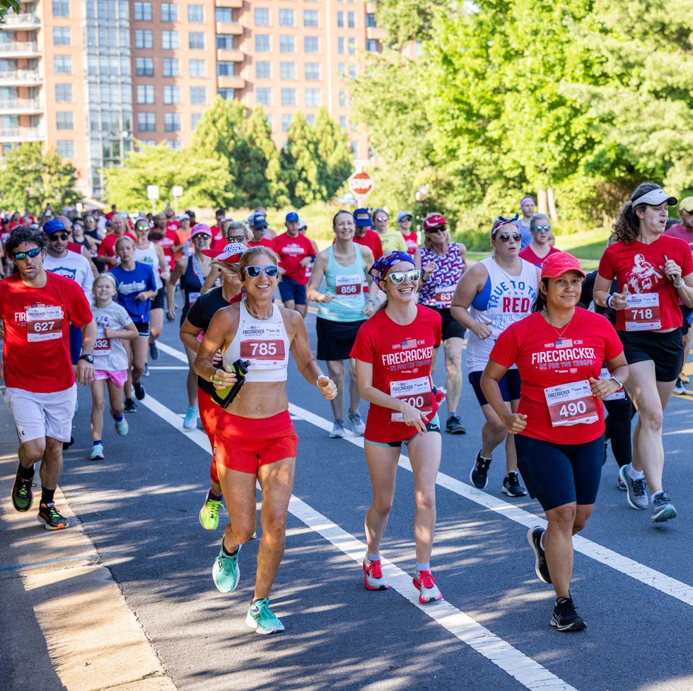 dogs and their owners in the furry 5k