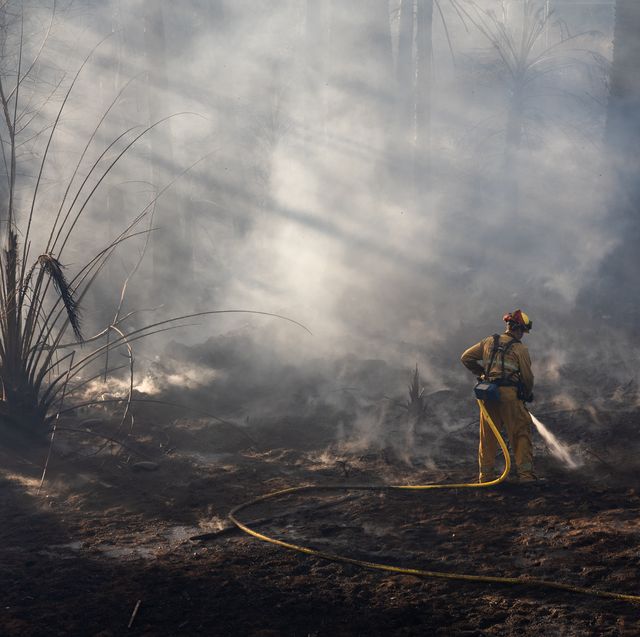 jurupa valley ca  june 17 a firefighter battles a brush fire that broke out friday afternoon on june 17 2022 in jurupa valley, california