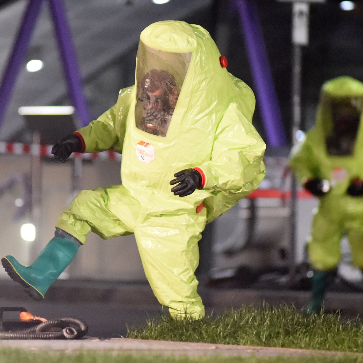 https://hips.hearstapps.com/hmg-prod/images/firefighter-wearing-a-hazmat-suit-takes-part-in-the-news-photo-1575580700.jpg?crop=0.718xw:1xh;center,top&resize=1200:*