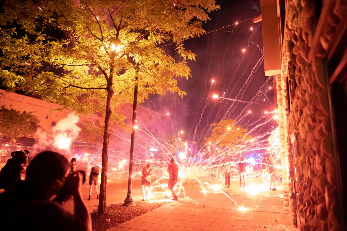 minneapolis, mn may 27 protesters lobbed fireworks, rocks and glass bottles at police near the third precinct"nprotester and police clashed violently in south minneapolis as looters attacked business on lake street on wednesday, may 27, 2020 in minneapolis the protests were sparked by the death of george floyd at the hands of a minneapolis police officer monday  photo by mark vancleavestar tribune via getty images