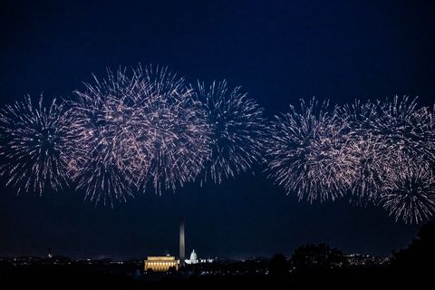 this is a horizontal color image of the view from arlington ridge park of the white house, washington monument, and lincoln memorial in washington dc surrounded by the fourth of july fireworks display in washington dc on thursday, july 4, 2019