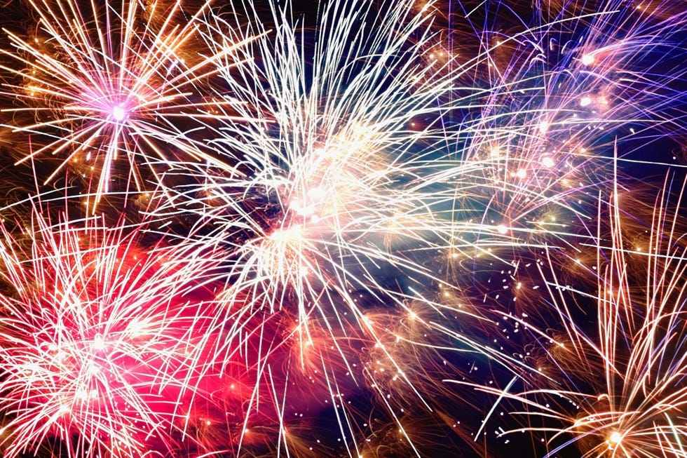 fireworks display at night, low angle view