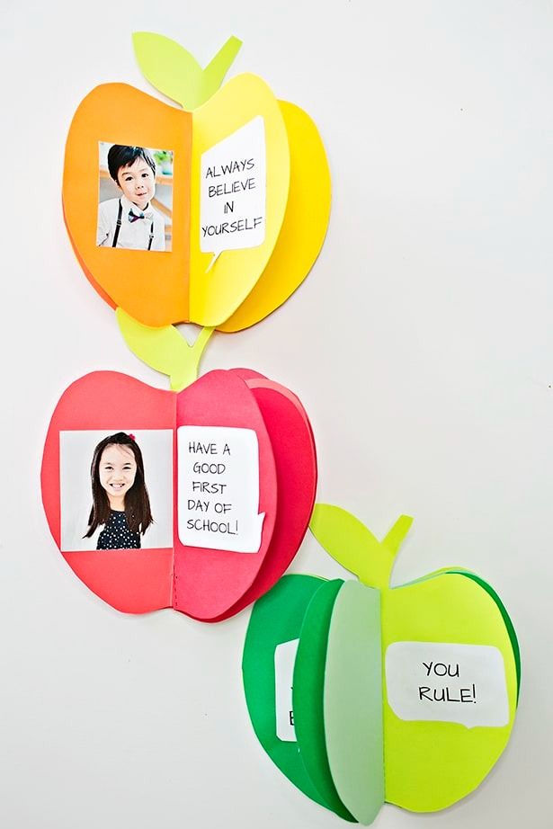 apple shaped books with student pictures and reminders inside
