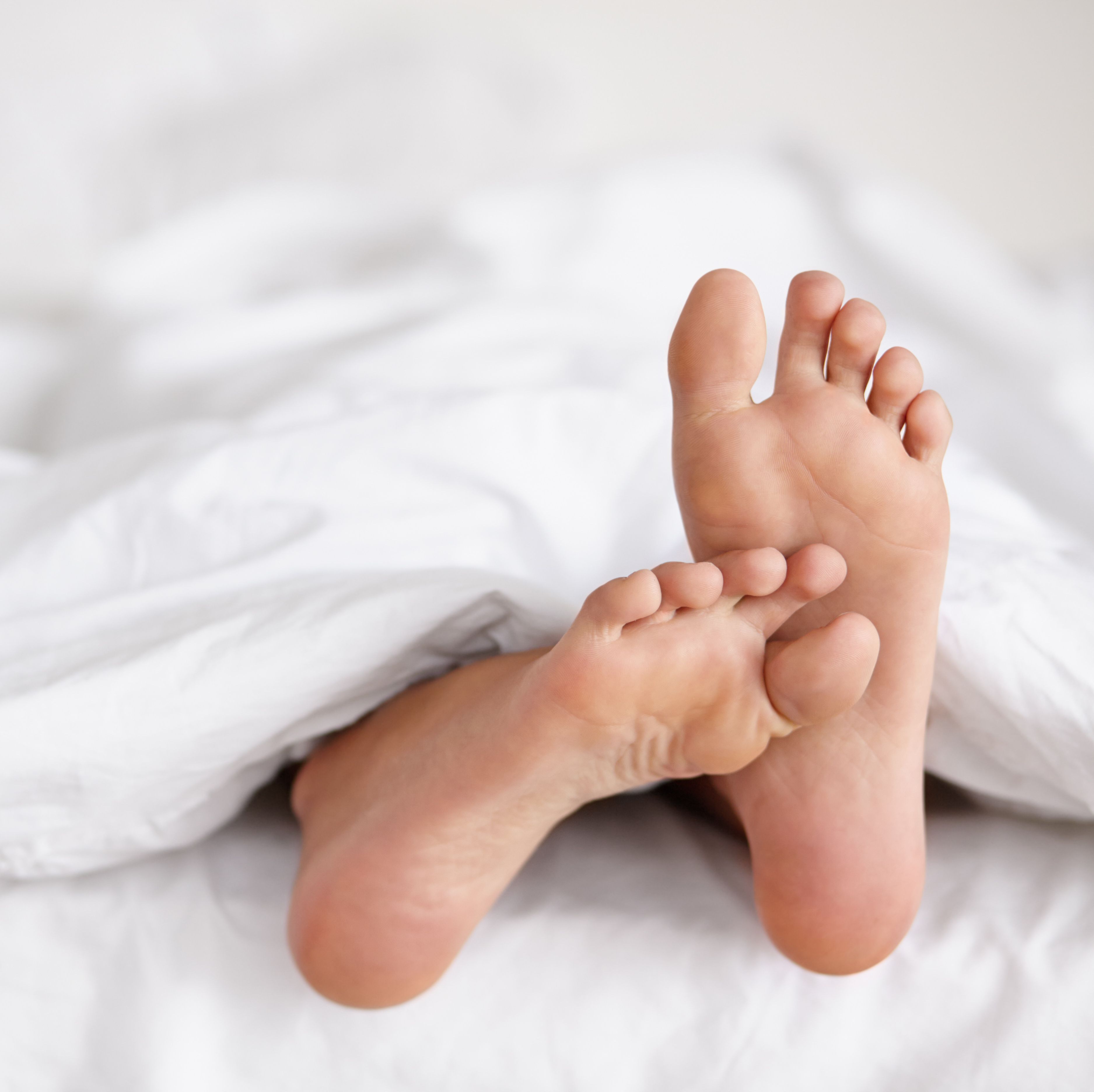 The Real Reason Why Your Feet Are So Itchy, According to Experts