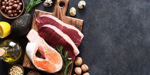 fish, meat and vegetables on a concrete background foods with vitamin b content balanced diet the keto diet