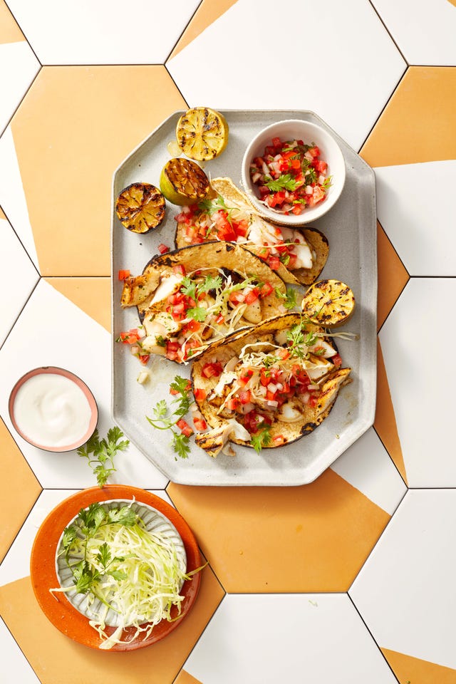 fish tacos with pico de gallo on a platter