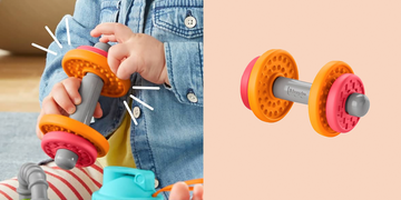 the fisherprice dummbell toy from the baby biceps gift set