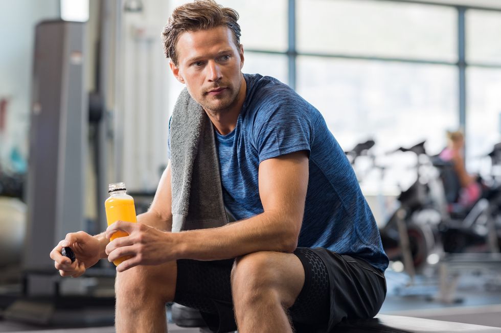 fit man with energy drink