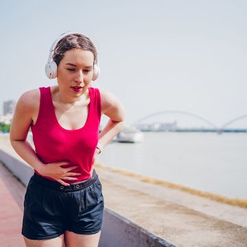 fit sportswoman taking a break