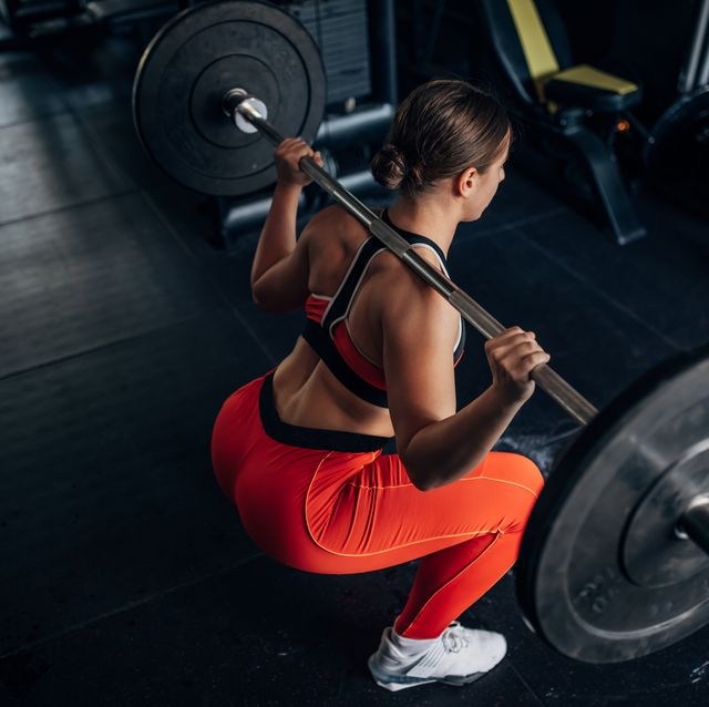 fit woman training with weights