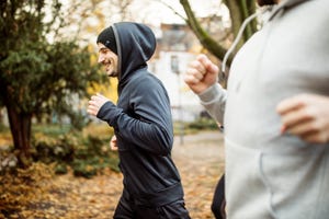 Fit young man jogging in the park