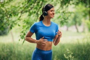 fit young woman jogging in park