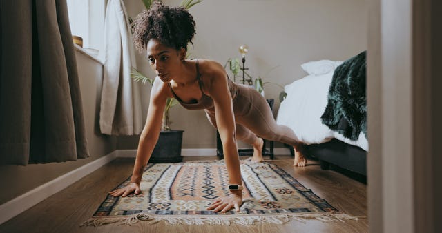 https://hips.hearstapps.com/hmg-prod/images/fitness-black-woman-and-push-up-exercise-in-home-royalty-free-image-1724855074.jpg?crop=1xw:0.94815xh;center,top&resize=640:*