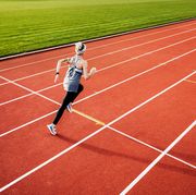 fitness enthusiast running on outdoor track