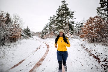 fitness running woman in winter season