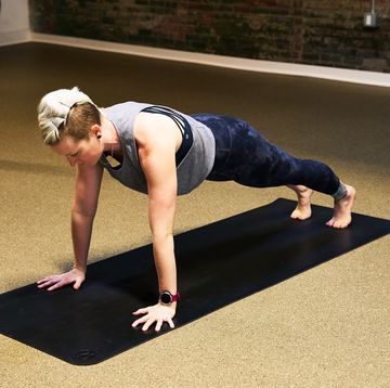a person doing a high plank