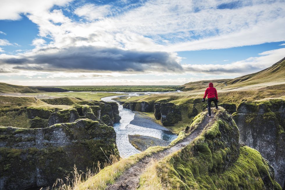 Fjadrargljufur, Iceland, Europe. A man admires the panorama