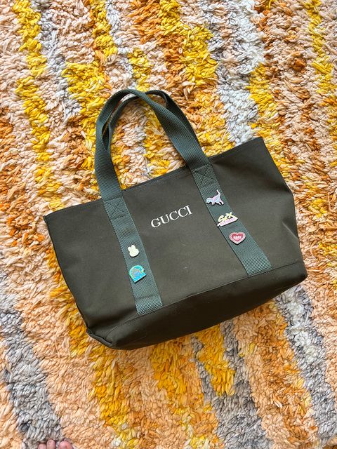 faran krentcil's gucci tote in a story about the ll bean ironic boat and tote
