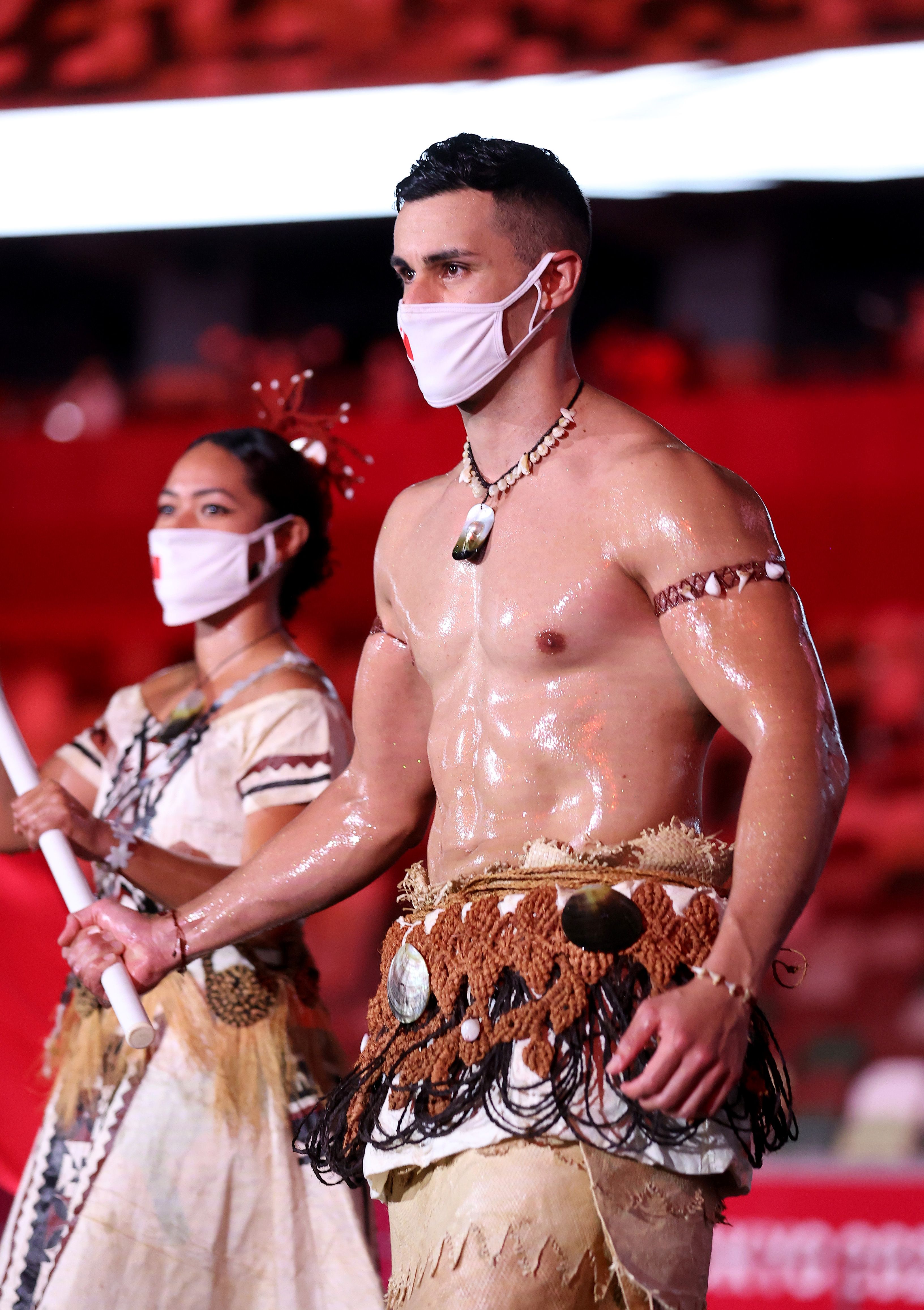 11 Photos Of Tonga's Shirtless Flag Bearer From The Olympics