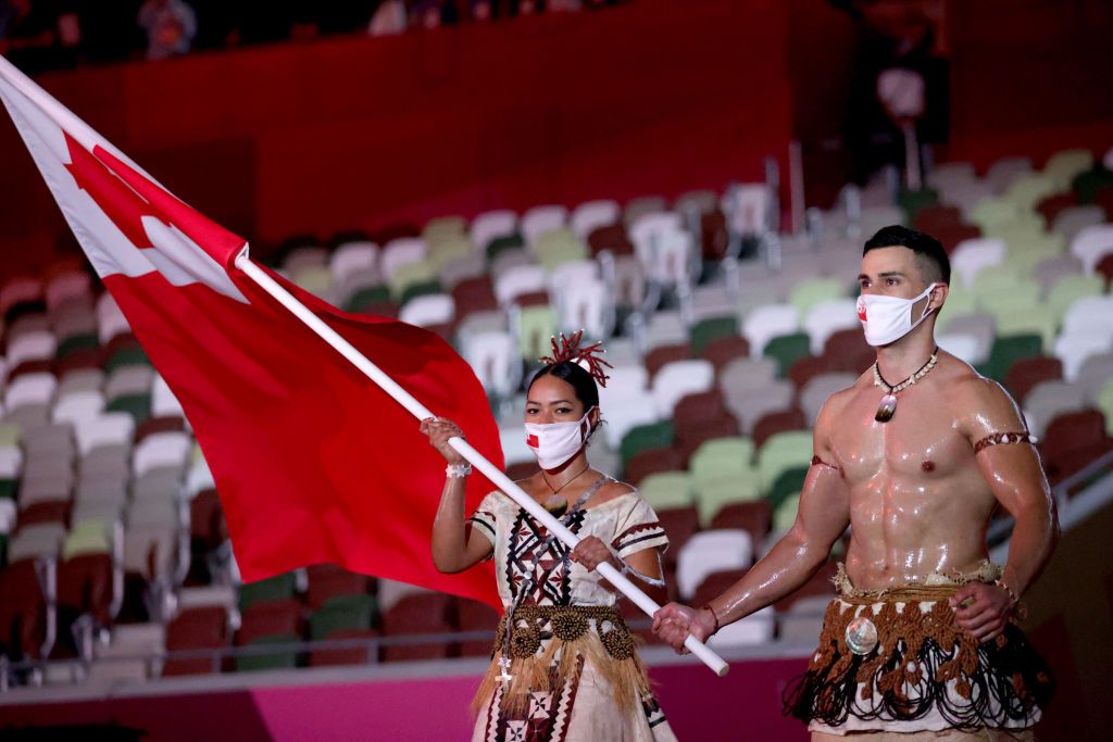 11 Photos Of Tonga's Shirtless Flag Bearer From The Olympics