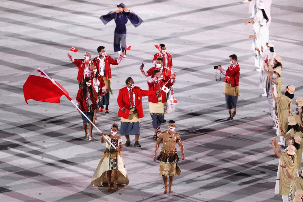 11 Photos of Tonga's Shirtless Flag Bearer from the Olympics