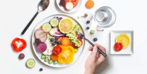 Flat lay colourful vegan food healthy eating lifestyle still life.